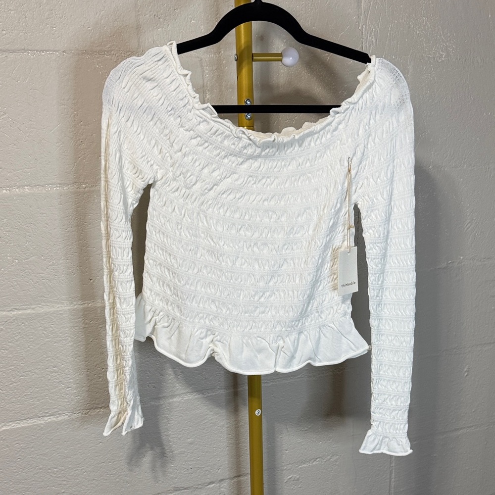 Elegant White Ruffled Blouse